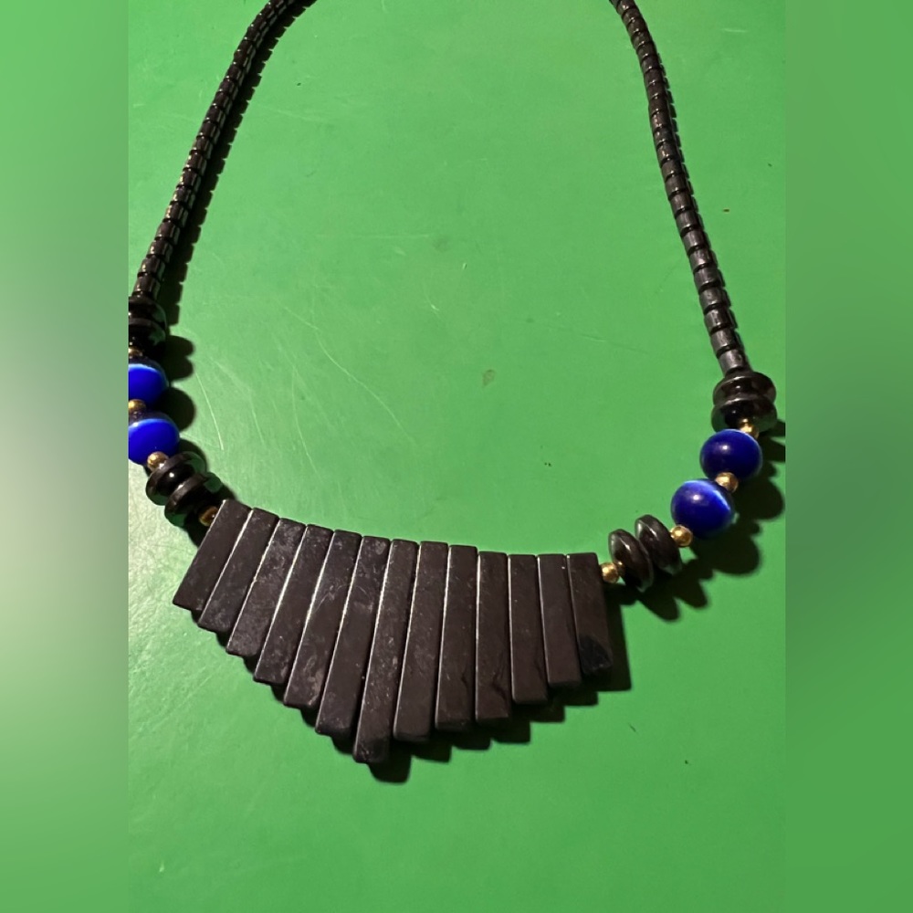 This necklace appears to be beads of hematite and something else?